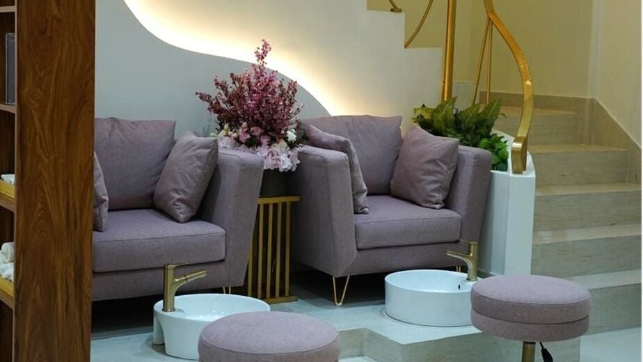 Pedicure corner with armchairs and foot basins